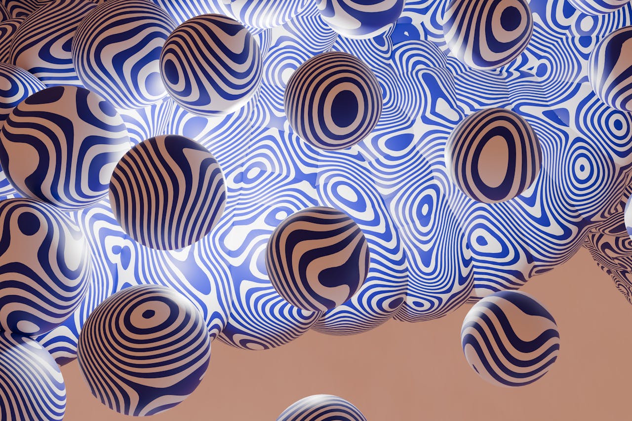 contact-img Dynamic 3D image of spheres with blue wavy patterns creating an abstract visual effect.